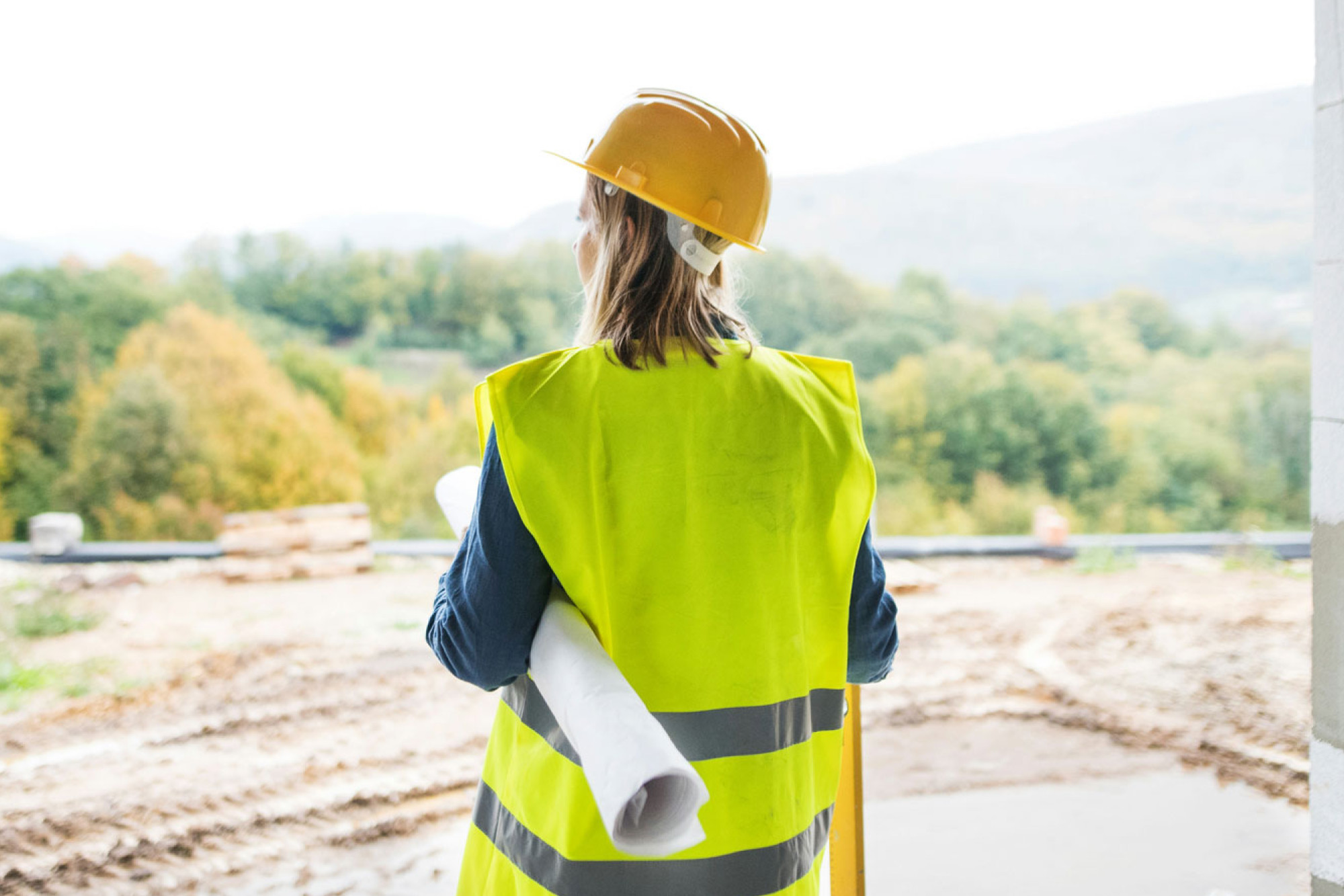 Property developer looking out onto green space